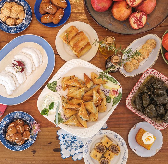 greek lady food festive table
